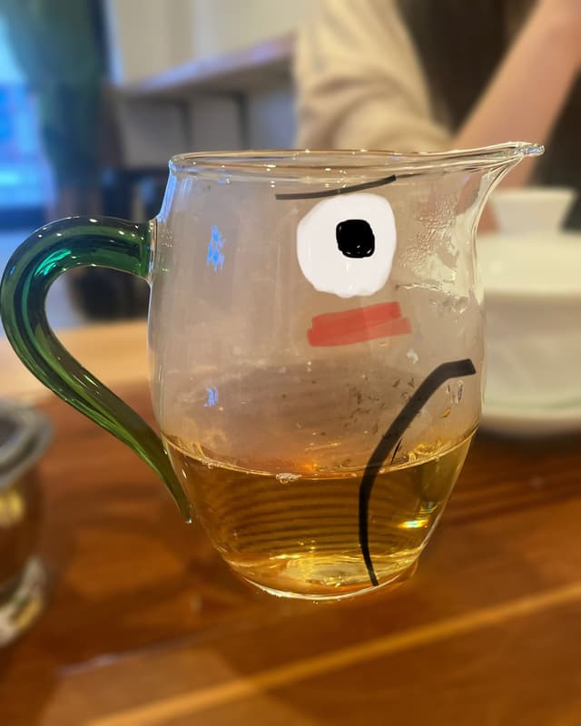 a person serving tea